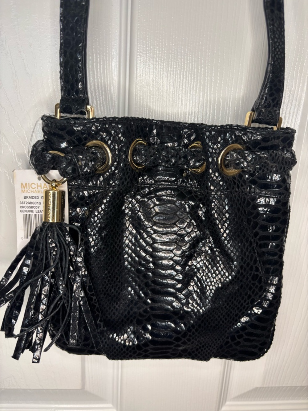 Michael Kors braided grommet in black Crossbody Bag - Textured genuine leather